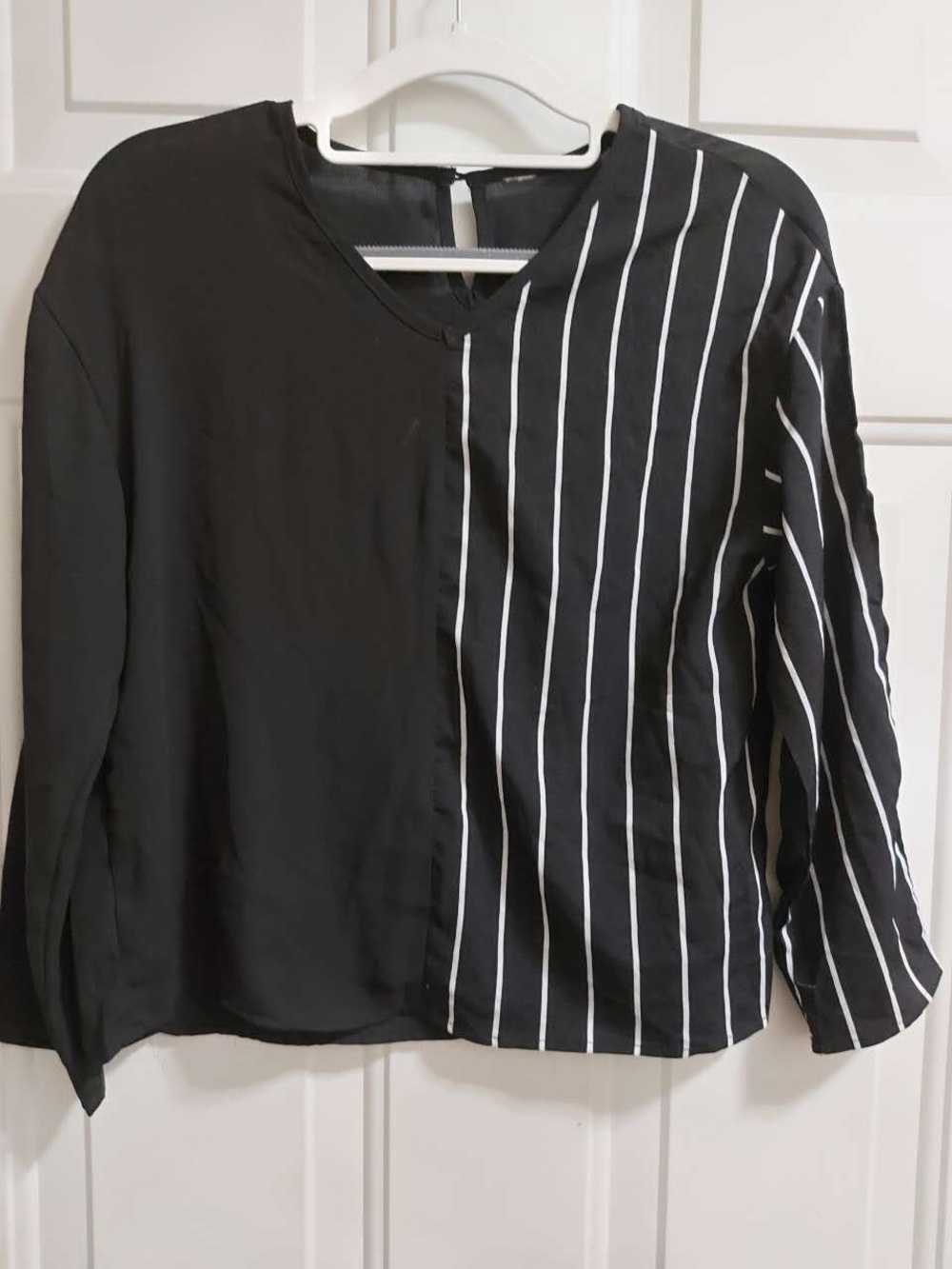 Black and white striped long sleeve blouse